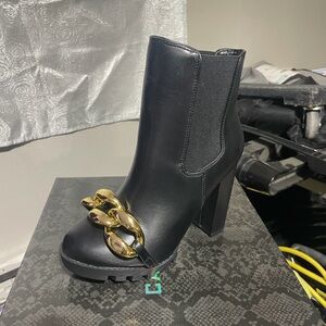 Cape Robbin Black Heeled Boots with Gold Chain